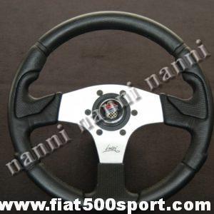 Art. 0052 - Volante Fiat 500 Giannini con razze satinate completo di mozzo e pulsante clacson Giannini. - Volante Fiat 500 Giannini con razze satinate.(specificare se lo si desidera con mozzo per 126). Il diametro esterno è di 320 mm.
Art. 0052 - Volante Fiat 500 Giannini con razze satinate completo di mozzo e pulsante clacson Giannini. - Volante Fiat 500 Giannini con razze satinate.(specificare se lo si desidera con mozzo per 126). Il diametro esterno è di 320 mm.