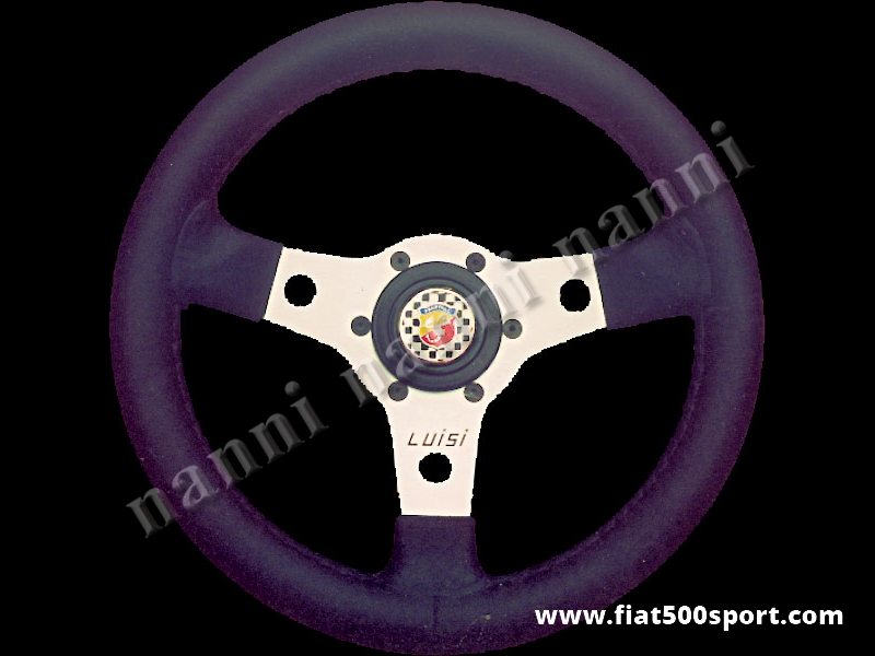 Art. 0010 - Volante Fiat 500 Fiat 126 Abarth in pelle nera con razze satinate completo di mozzo e pulsante clacson Abarth. - Volante Fiat 500 Fiat 126 Abarth in pelle nera con razze satinate.(Specificare nelle note se lo si desidera con mozzo per 126). Il diametro esterno è di 315 mm.
Art. 0010 - Volante Fiat 500 Fiat 126 Abarth in pelle nera con razze satinate completo di mozzo e pulsante clacson Abarth. - Volante Fiat 500 Fiat 126 Abarth in pelle nera con razze satinate.(Specificare nelle note se lo si desidera con mozzo per 126). Il diametro esterno è di 315 mm.