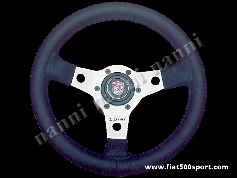 Art. 0011 - Fiat 500 Giannini original leather steering wheel with hub (satined spokes). - Fiat 500 Giannini original leather steering wheel with hub (satined spokes). Outer diameter 315 mm.
