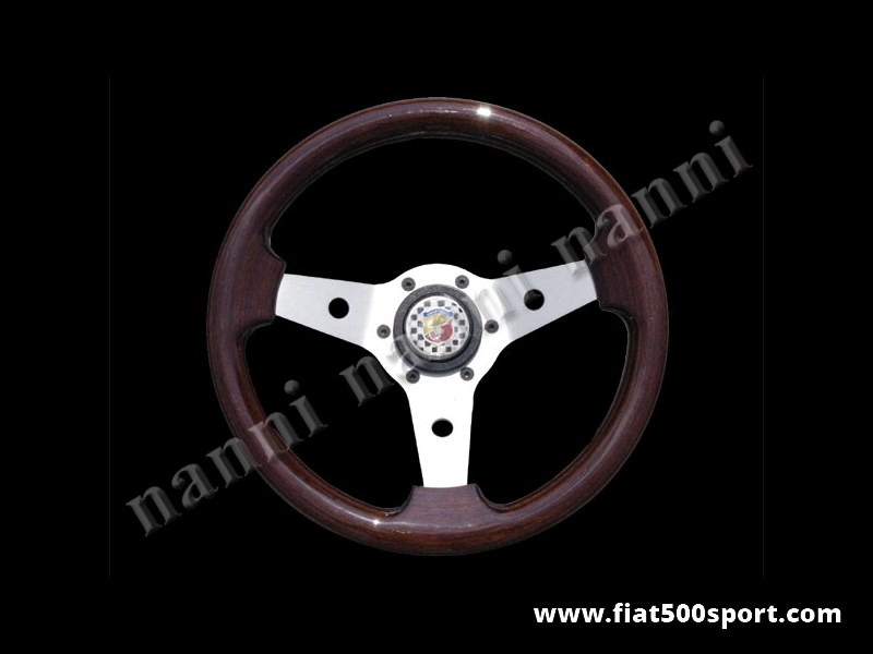 Art. 0014 - Volante  Fiat 500 Fiat 126 Abarth in mogano a calice con razze satinate completo di mozzo e pulsante clacson Abarth. - Volante Fiat 500 Fiat 126 Abarth in legno di mogano a calice con razze satinate completo di mozzo per Fiat 500 e pulsante clacson Abarth. (specificare nelle note se lo si desidera con mozzo per Fiat 126) Il diametro esterno è di 315 mm.
