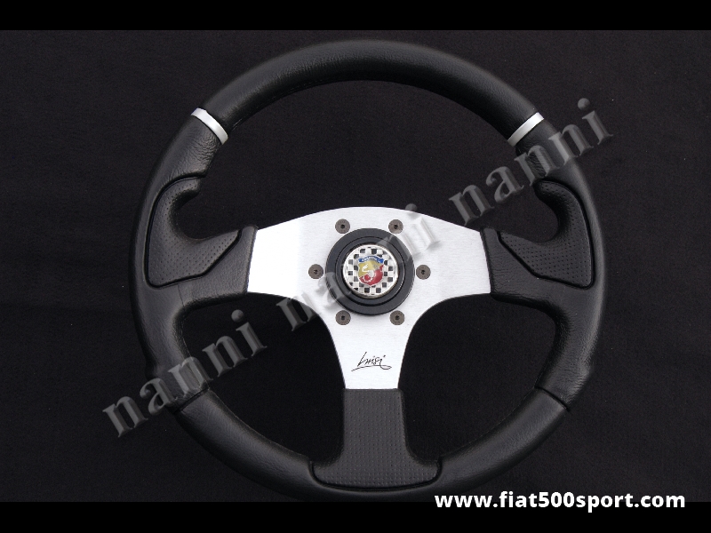 Art. 0051 - Volante Fiat 500 Fiat 126 Abarth con razze satinate completo di mozzo e pulsante clacson Abarth. - Volante Fiat 500 Fiat 126 Abarth con razze satinate.(specificare nelle note se lo si desidera con mozzo per 126). Il diametro esterno è di 320 mm.
Art. 0051 - Volante Fiat 500 Fiat 126 Abarth con razze satinate completo di mozzo e pulsante clacson Abarth. - Volante Fiat 500 Fiat 126 Abarth con razze satinate.(specificare nelle note se lo si desidera con mozzo per 126). Il diametro esterno è di 320 mm.