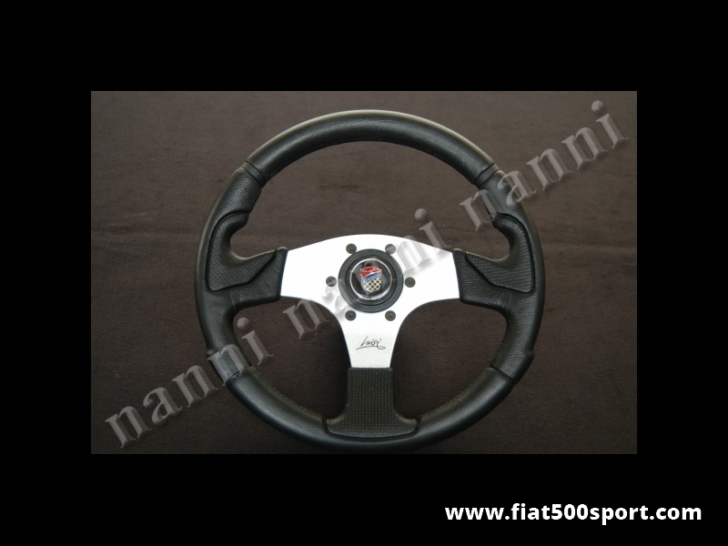 Art. 0052 - Volante Fiat 500 Giannini con razze satinate completo di mozzo e pulsante clacson Giannini. - Volante Fiat 500 Giannini con razze satinate.(specificare se lo si desidera con mozzo per 126). Il diametro esterno è di 320 mm.
Art. 0052 - Volante Fiat 500 Giannini con razze satinate completo di mozzo e pulsante clacson Giannini. - Volante Fiat 500 Giannini con razze satinate.(specificare se lo si desidera con mozzo per 126). Il diametro esterno è di 320 mm.