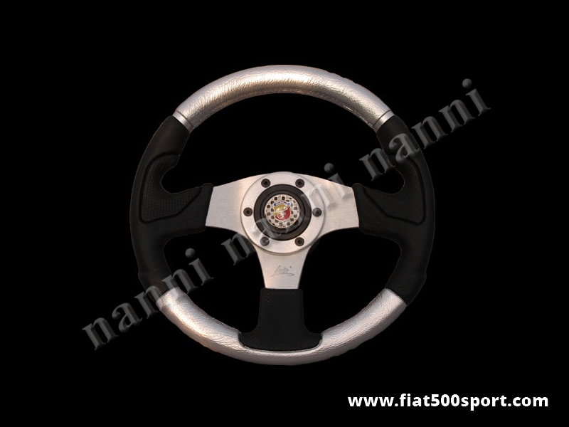 Art. 0055 - Fiat 500 Abarth silver steering wheel with hub. - Fiat 500 Abarth silver steering wheel with hub. Outer diameter 320 mm.
