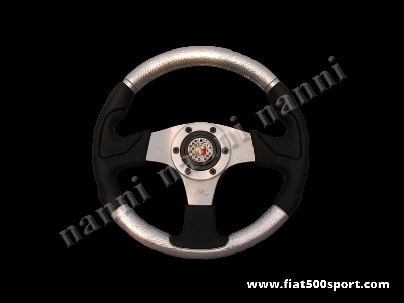 Art. 0055 - Volante Fiat 500 Fiat 126 Abarth in pelle color argento, completo di mozzo e pulsante clacson Abarth. - Volante Fiat 500 Fiat 126 Abarth in pelle color argento.(specificare nelle note se lo si desidera con mozzo per 126). Il diametro esterno è di 320 mm.
Art. 0055 - Volante Fiat 500 Fiat 126 Abarth in pelle color argento, completo di mozzo e pulsante clacson Abarth. - Volante Fiat 500 Fiat 126 Abarth in pelle color argento.(specificare nelle note se lo si desidera con mozzo per 126). Il diametro esterno è di 320 mm.