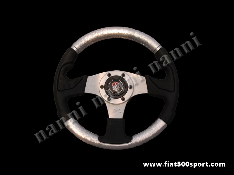 Art. 0056 - Fiat 500 Giannini silver steering wheel with hub. - Fiat 500 Giannini silver steering wheel with hub. Outer diameter 320 mm.
