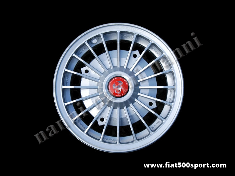 Art. 0073 - Cerchio ruota Fiat 500 Abarth in lega da 4,5 pollici x12 pollici e bulloni di fissaggio conici autocentranti. - Cerchio ruota Fiat 500 Fiat 126 prima serie Abarth in lega di altissima qualita’ verniciata, da 4,5 pollici di larghezza con bulloni di fissaggio conici autocentranti. (interasse bulloni ruota 190 mm.). ET 30.
Art. 0073 - Cerchio ruota Fiat 500 Abarth in lega da 4,5 pollici x12 pollici e bulloni di fissaggio conici autocentranti. - Cerchio ruota Fiat 500 Fiat 126 prima serie Abarth in lega di altissima qualita’ verniciata, da 4,5 pollici di larghezza con bulloni di fissaggio conici autocentranti. (interasse bulloni ruota 190 mm.). ET 30.