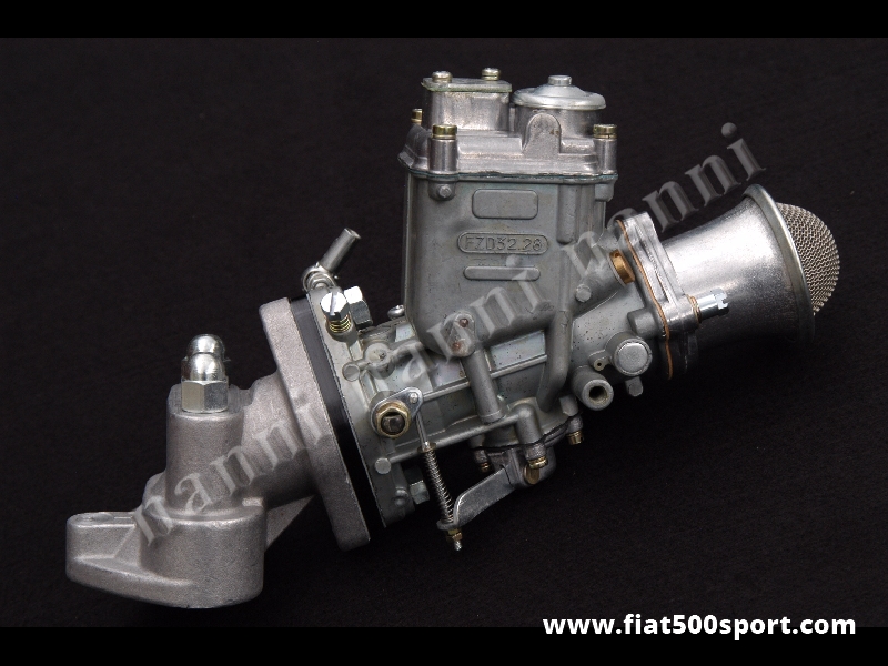 Art. 0171 - Carburatore Fiat 500 Fiat 126  FZD 32/28 nuovo con collettore e trombetta. - Carburatore Fiat 500 Fiat 126 nuovo FZD 32/28 con collettore di aspirazione, distanziale e trombetta. In dotazione ci sono inoltre getti di vario tipo per carburarlo con raccordi e tiranteria.
