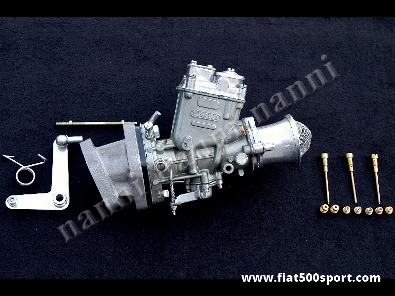 Art. 0171G - Carburatore Fiat 500 Giardiniera FZD 32/28 nuovo con collettore e trombetta. - Carburatore Fiat 500 Giardiniera nuovo FZD 32/28 con collettore di aspirazione, distanziale e trombetta. In dotazione ci sono getti di vario tipo, raccordi e tiranteria.
