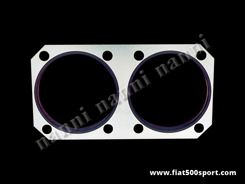 Art. 0286 - Piastra Fiat 500 F L in acciaio NANNI per rinforzo monoblocco per applicazione canne 650 cc alte 80 mm. con alesaggio diametro 77 mm. - Piastra Fiat 500 F L in acciaio NANNI alta 10 mm. per rinforzare il monoblocco e alzare le canne 650 cc alte 80 mm. con alesaggio diametro 77 mm. È completa di 2 oil rings per una tenuta ottimale fra piastra e monoblocco.
