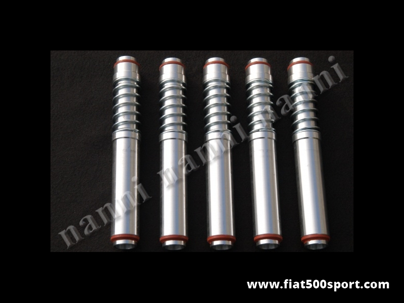 Art. 0387S - Cannette punterie Fiat 500 Fiat 126 Fiat Giardiniera Panda 30 NANNI modificate con molla e gommini al silicone. - Cannette Fiat 500 Fiat 126 copriaste delle punterie NANNI modificate con molla e gommini speciali al silicone di lunghissima durata nel tempo poiche’ sono molto resistenti alle alte temperature. Si montano senza smontare la testata. Indispensabili per i cilindri abbassati. I nostri astucci hanno 2 oil rings all’interno per una migliore tenuta ai gas compressi e hanno le molle deidrogenate. Kit completo.
